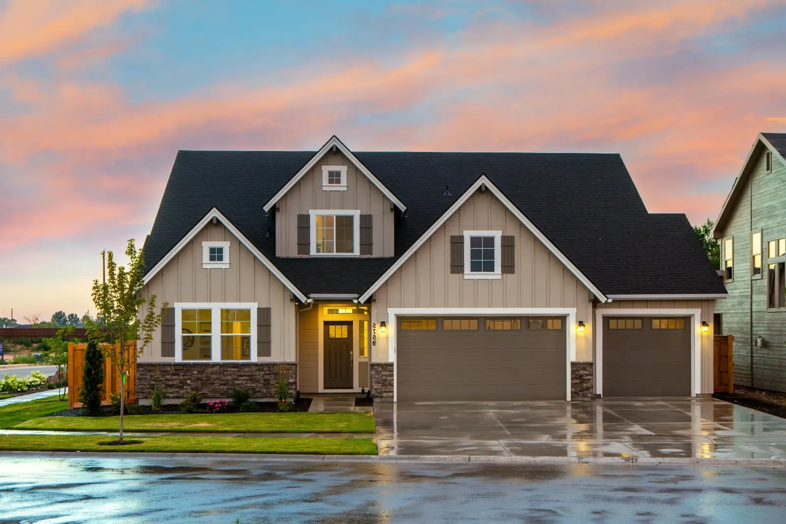 Minnesota home with a new architectural shingle roof at dusk